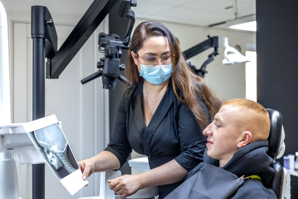 Comparison of dental implants and dentures as tooth replacement options at Progressive Dentistry & Orthodontics in Chandler, AZ